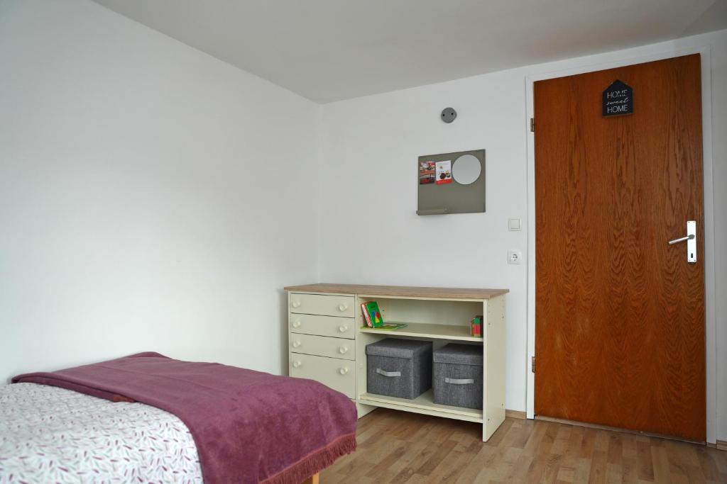 Postel nebo postele na pokoji v ubytování House Minka
