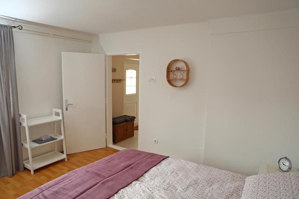 Postel nebo postele na pokoji v ubytování House Minka