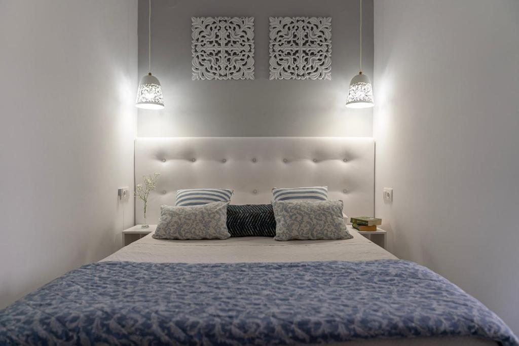 Postel nebo postele na pokoji v ubytování Roxani Hotel