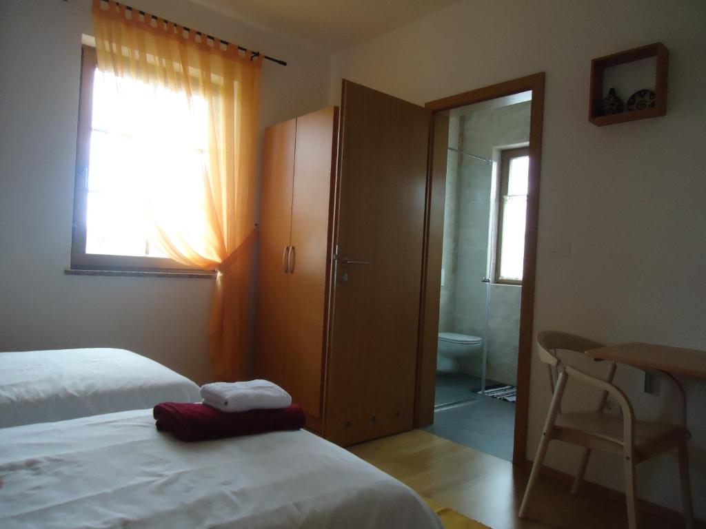 Postel nebo postele na pokoji v ubytování Lipizzaner Lodge Guest House