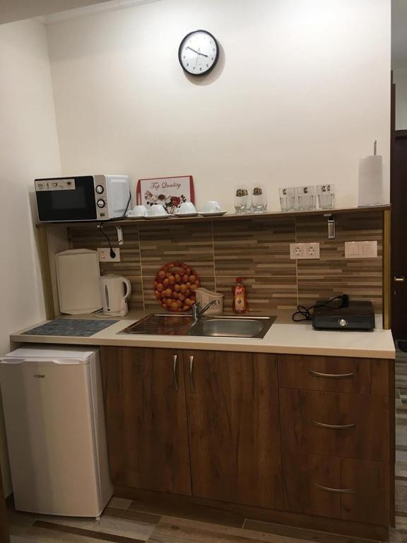 Kuchnia lub aneks kuchenny w obiekcie Aranykorona Apartmanház