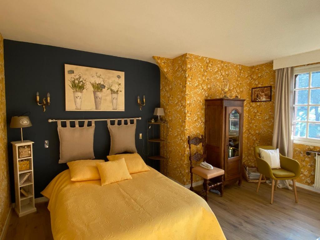 Postel nebo postele na pokoji v ubytování Le Clos Ronsard Suite Parentale