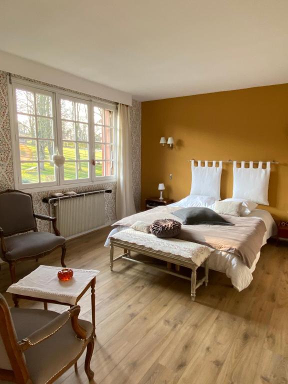 Postel nebo postele na pokoji v ubytování Le Clos Ronsard Suite Parentale