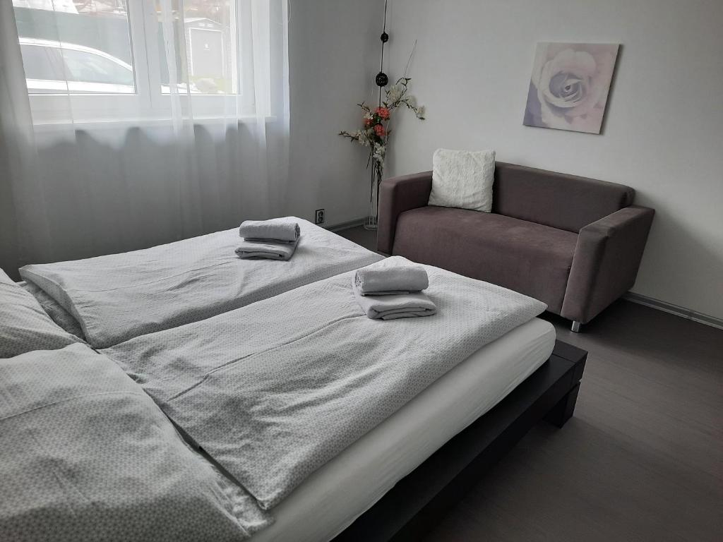 Postel nebo postele na pokoji v ubytování Ela Apartment Vilová