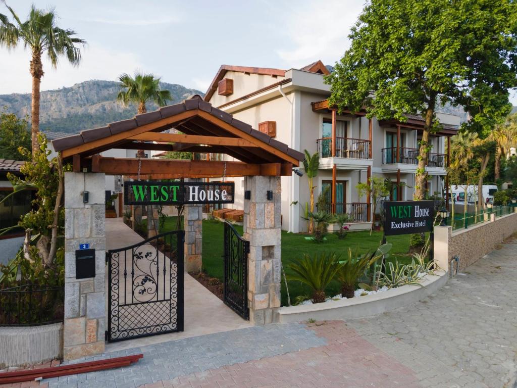 a gate in front of a west house at WEST HOUSE EXCLUSIVE HOTEL in Göcek