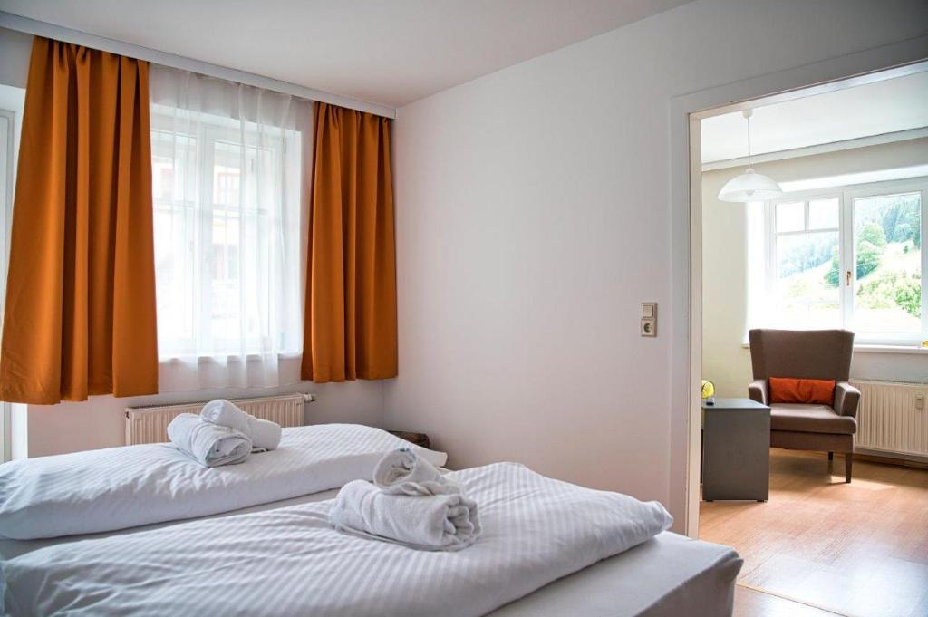Posteľ alebo postele v izbe v ubytovaní GRASSEGGER APPARTEMENTHAUS