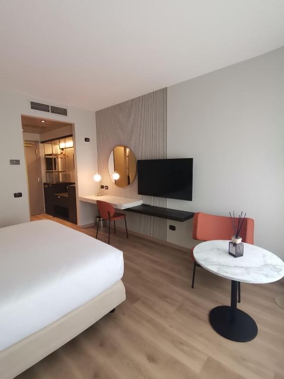 TV a/nebo společenská místnost v ubytování Agora' Palace Hotel
