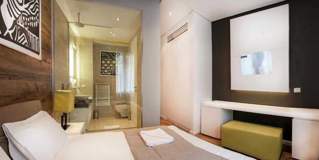 Voodi või voodid majutusasutuse Eden Garden Suites toas