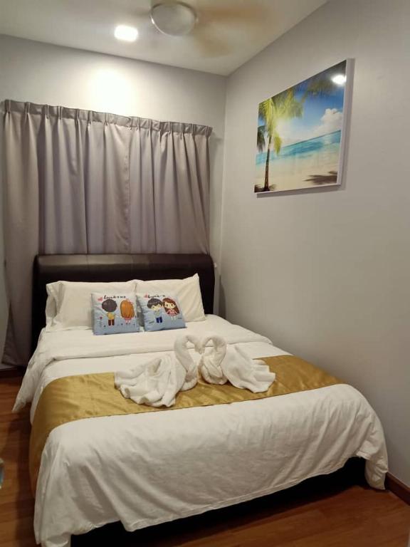 Postel nebo postele na pokoji v ubytování Sekinchan SeaView Homestay 034 高楼看海阳台民宿