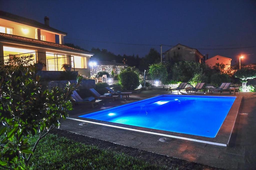 Piscina a *****Pool house with beautiful seaview,big garden and old tavern***** o a prop