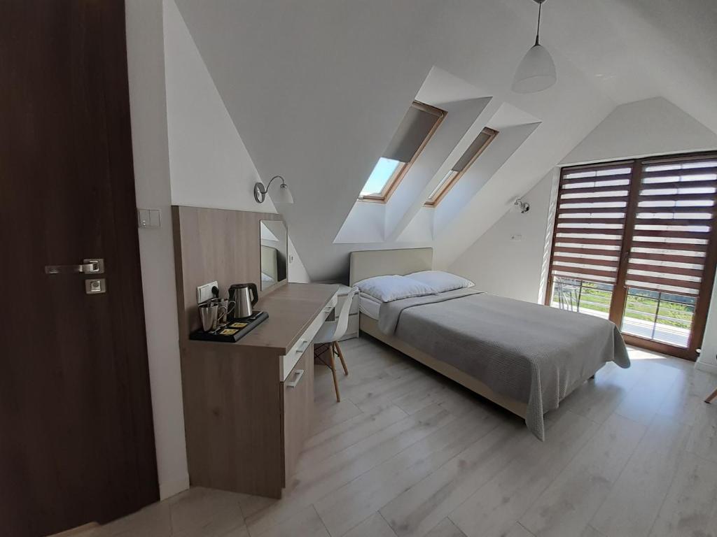 Postel nebo postele na pokoji v ubytování Willa Trawers