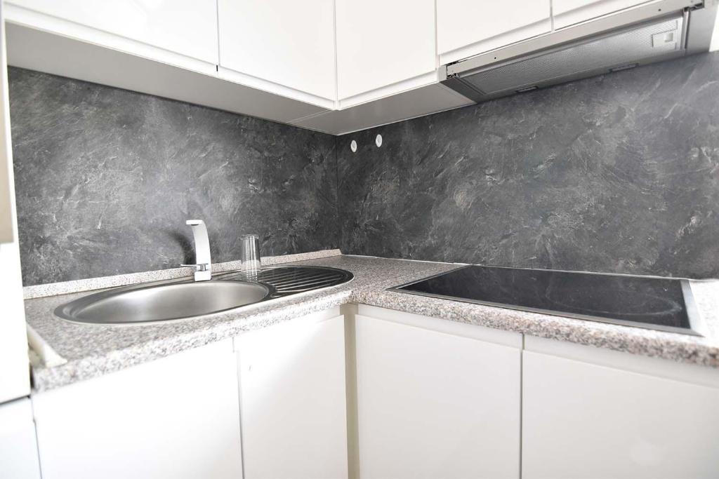 Kuchyň nebo kuchyňský kout v ubytování Moderne Ferienwohnung mit Sat-TV & WLAN