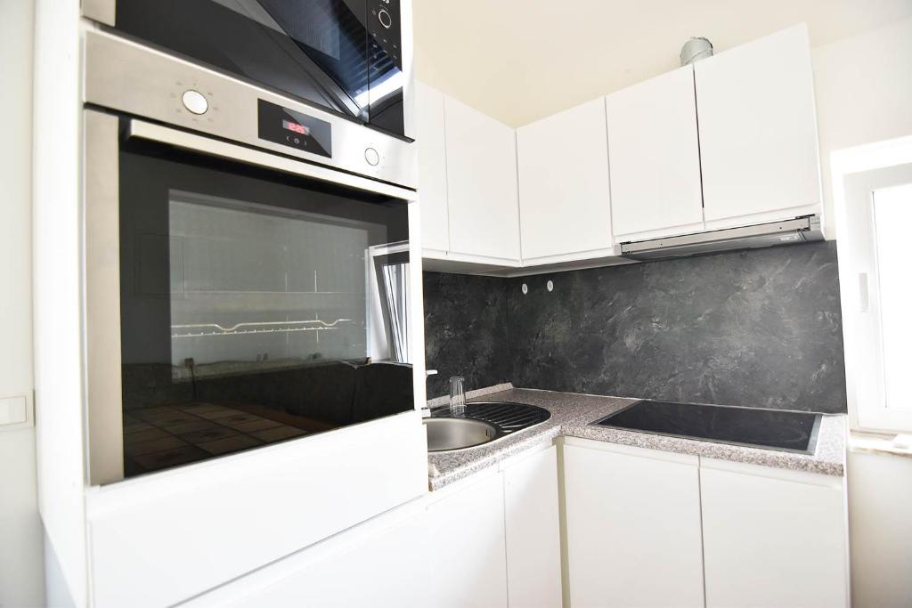 Kuchyň nebo kuchyňský kout v ubytování Moderne Ferienwohnung mit Sat-TV & WLAN