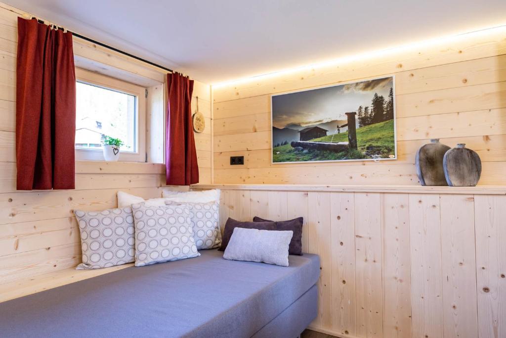 Postel nebo postele na pokoji v ubytování STAUDACH - Alpinresidenz Zillertal