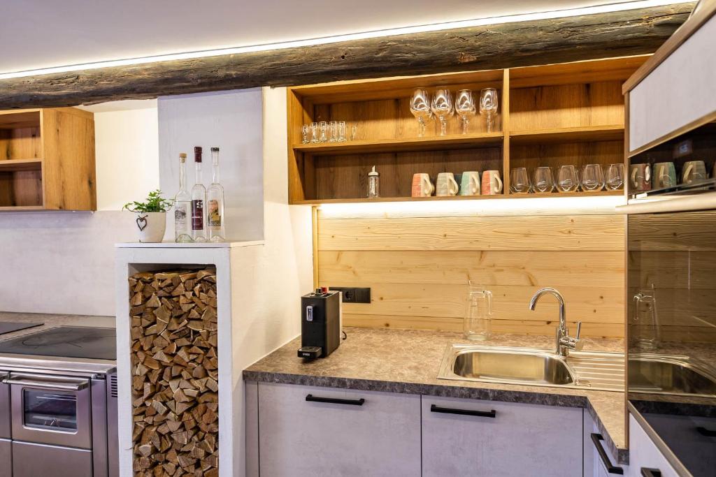 Kuchyň nebo kuchyňský kout v ubytování STAUDACH - Alpinresidenz Zillertal