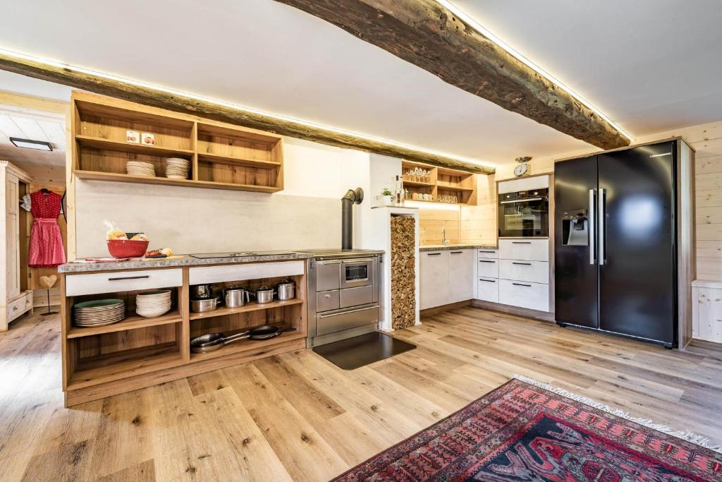 Kuchyň nebo kuchyňský kout v ubytování STAUDACH - Alpinresidenz Zillertal