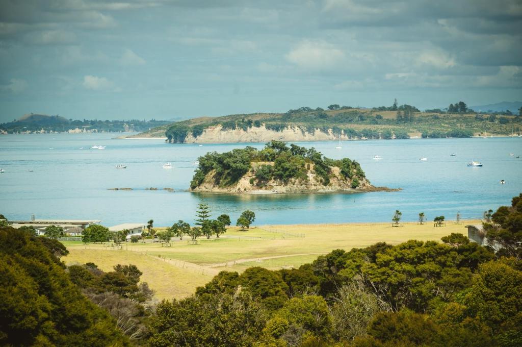 an island in the middle of a large body of water at Winemakers Loft in Oneroa