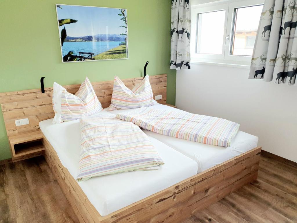 Postel nebo postele na pokoji v ubytování Haus Leitner