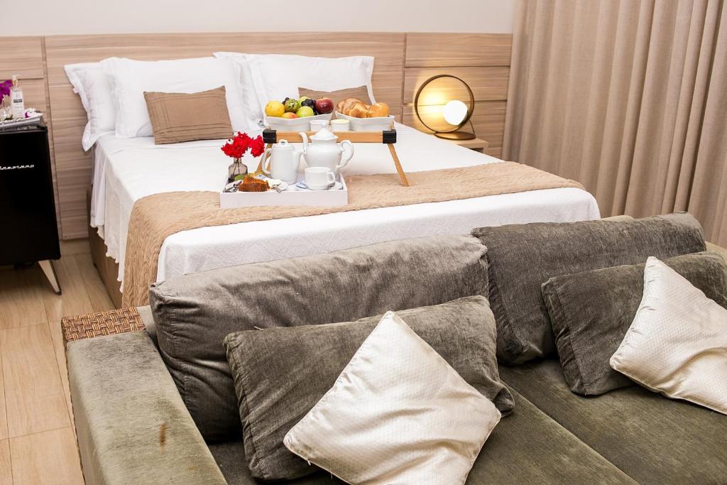 Postel nebo postele na pokoji v ubytování Le Parc Hotel