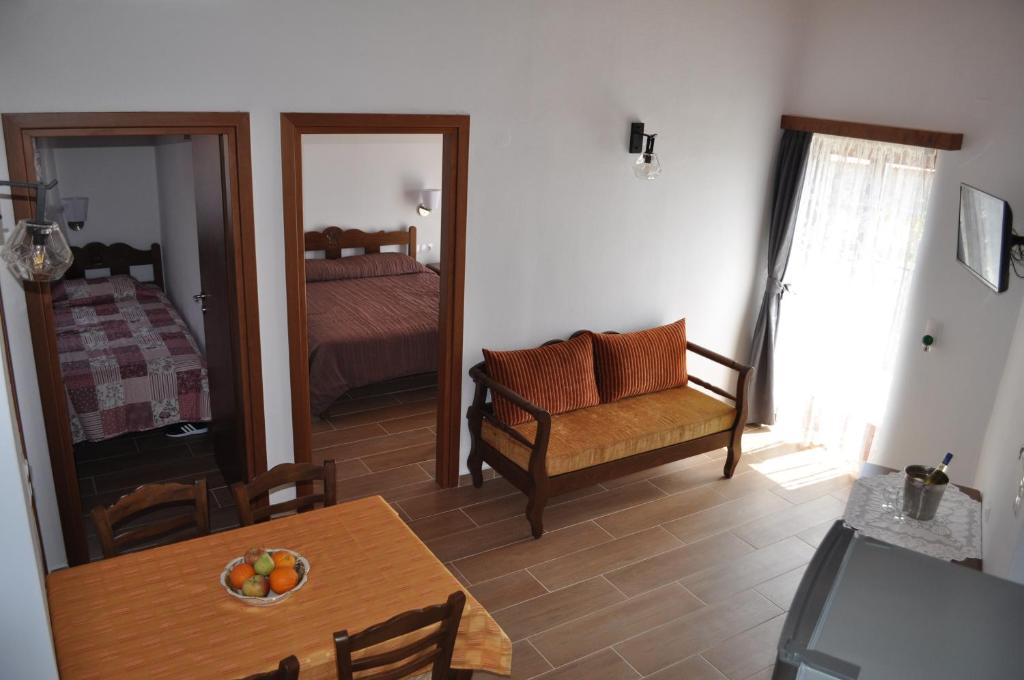 Postel nebo postele na pokoji v ubytování Vrachos Villas