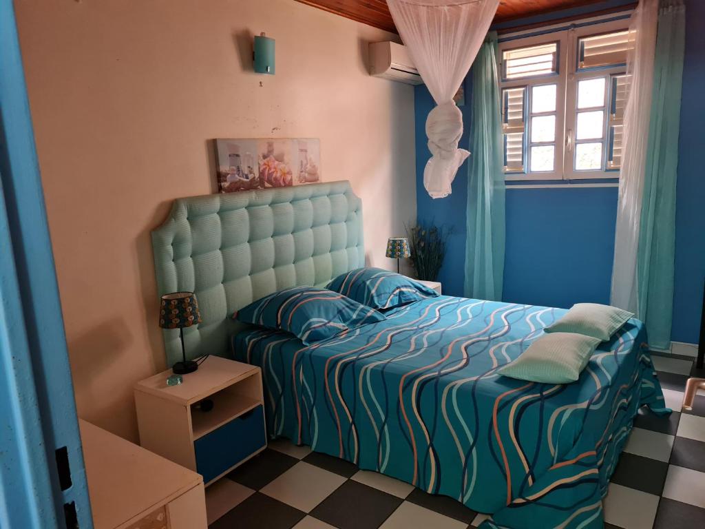 Postel nebo postele na pokoji v ubytování La Villa Rosier