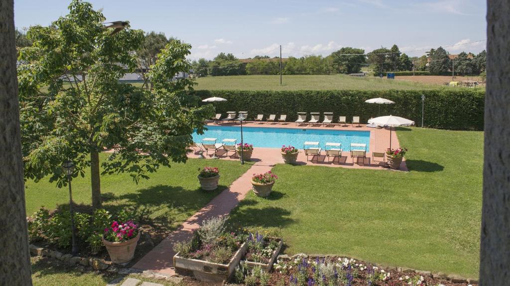 The swimming pool at or close to Le Caselle 26, Emma Villas