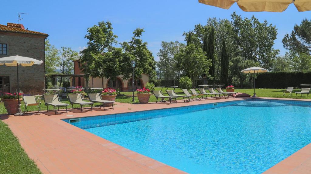 The swimming pool at or close to Le Caselle 26, Emma Villas