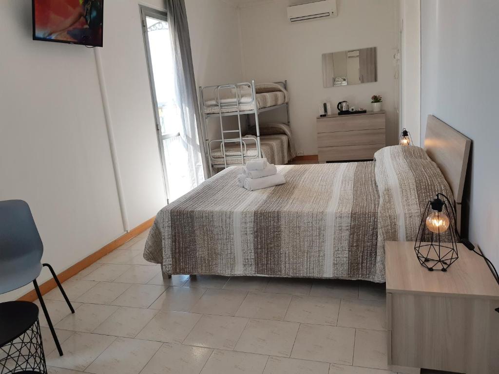 Postel nebo postele na pokoji v ubytování Hotel Mara
