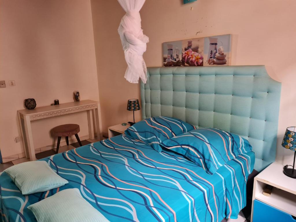Postel nebo postele na pokoji v ubytování La Villa Rosier