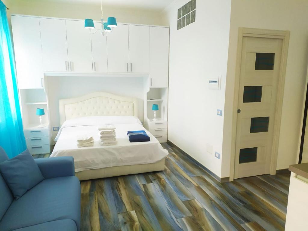 Cama ou camas em um quarto em La terrazza sul mare