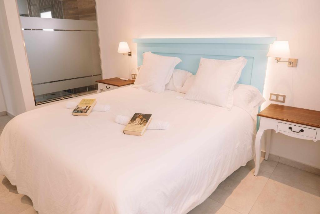 Posteľ alebo postele v izbe v ubytovaní Villa privada de lujo con piscina Villa Wabi Sabi