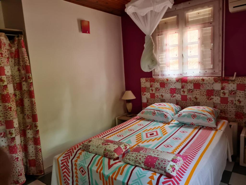 Postel nebo postele na pokoji v ubytování La Villa Rosier