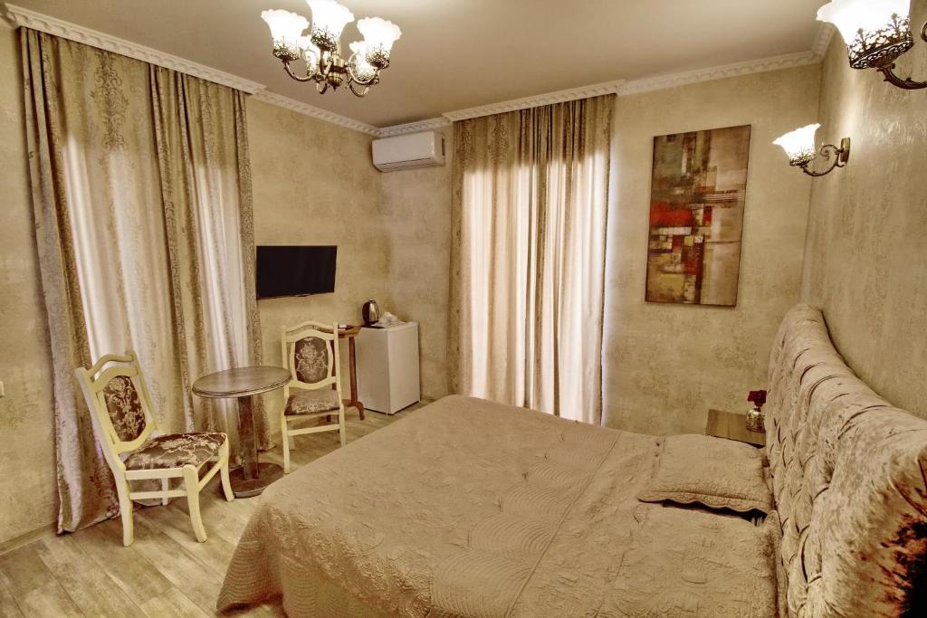 TV a/nebo společenská místnost v ubytování Old Tbilisi Gate