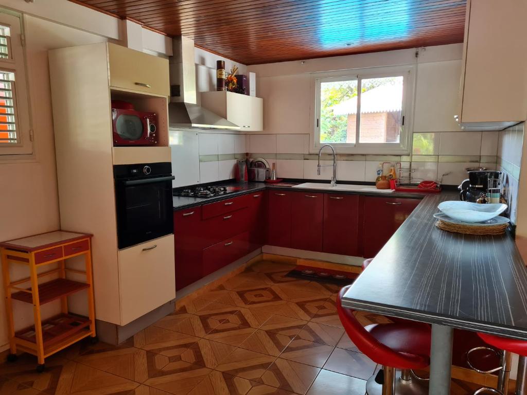 Kuchyň nebo kuchyňský kout v ubytování La Villa Rosier