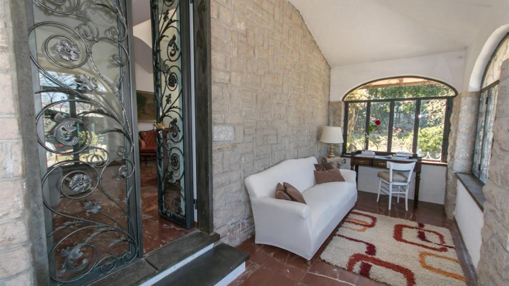 A seating area at Villa Ombrosa 8, Emma Villas