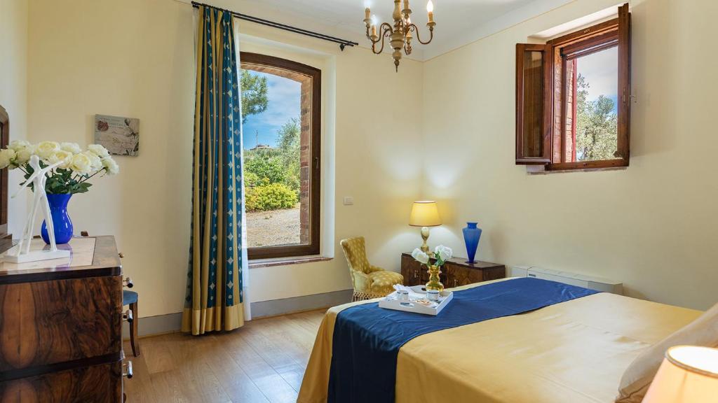 Łóżko lub łóżka w pokoju w obiekcie Villa Santa Maria 14, Emma Villas