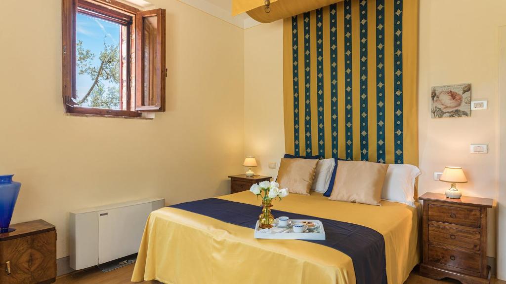 Łóżko lub łóżka w pokoju w obiekcie Villa Santa Maria 14, Emma Villas
