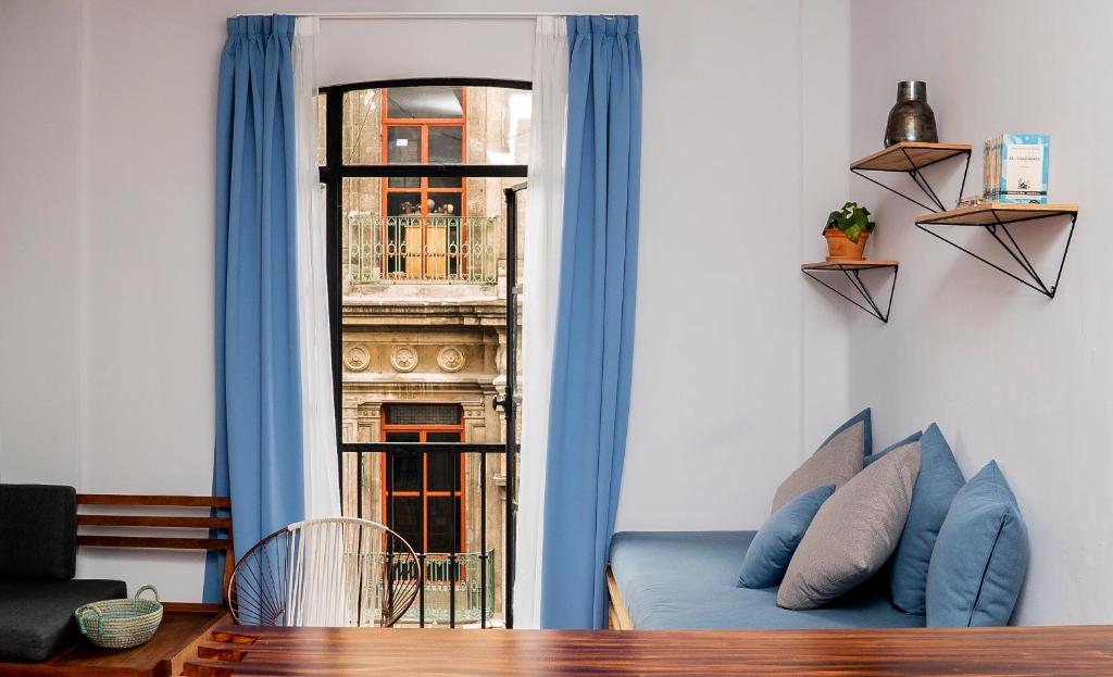 Uma área de estar em Casa Pepe