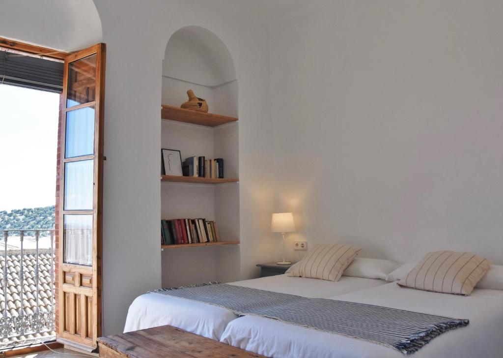 Postel nebo postele na pokoji v ubytování Casa Almara