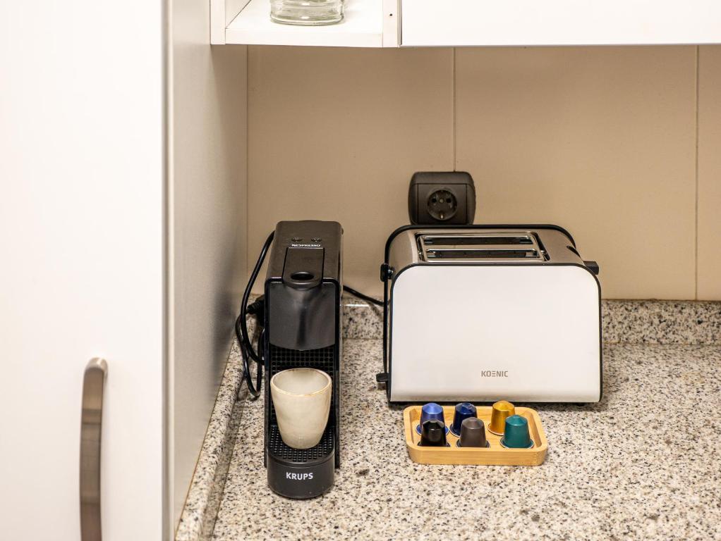 Coffee and tea making facilities at Recoleta Downtown Suite by Beauty Rentals