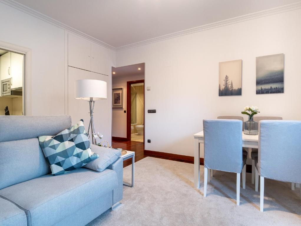 A seating area at Recoleta Downtown Suite by Beauty Rentals