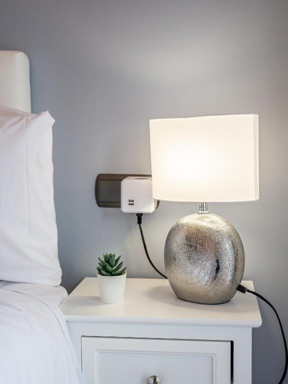 A bed or beds in a room at Recoleta Downtown Suite by Beauty Rentals