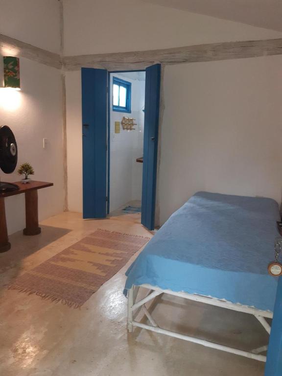 Postel nebo postele na pokoji v ubytování Pousada Casa da Praia Itaúnas