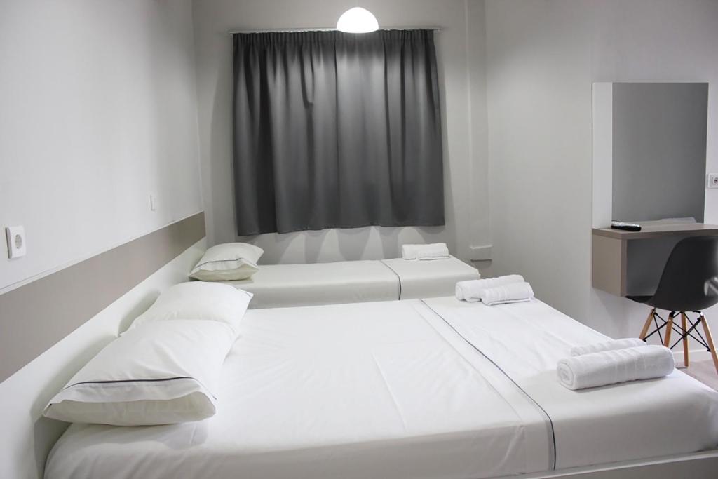 Postel nebo postele na pokoji v ubytování Hotel Cakalli