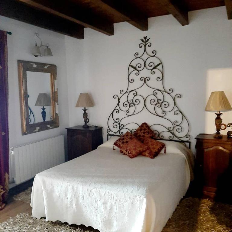 Postel nebo postele na pokoji v ubytování La Posada Del Canal