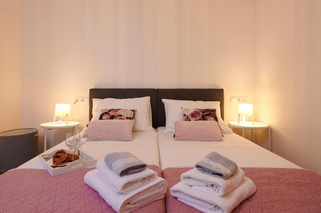Postel nebo postele na pokoji v ubytování New 4* apartman Zoa in Trogir