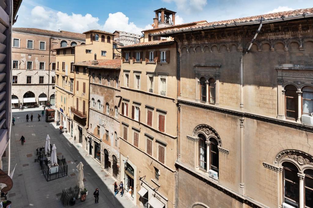 a view of a street in a city with buildings at Casa Clara Appartamenti - Danzettino in Perugia