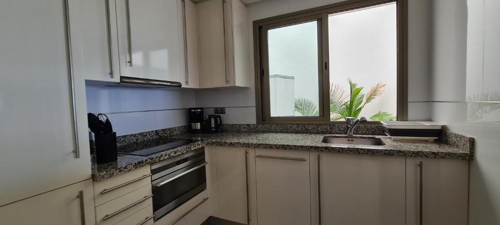 Kuchyň nebo kuchyňský kout v ubytování Apartamento El Atardecer