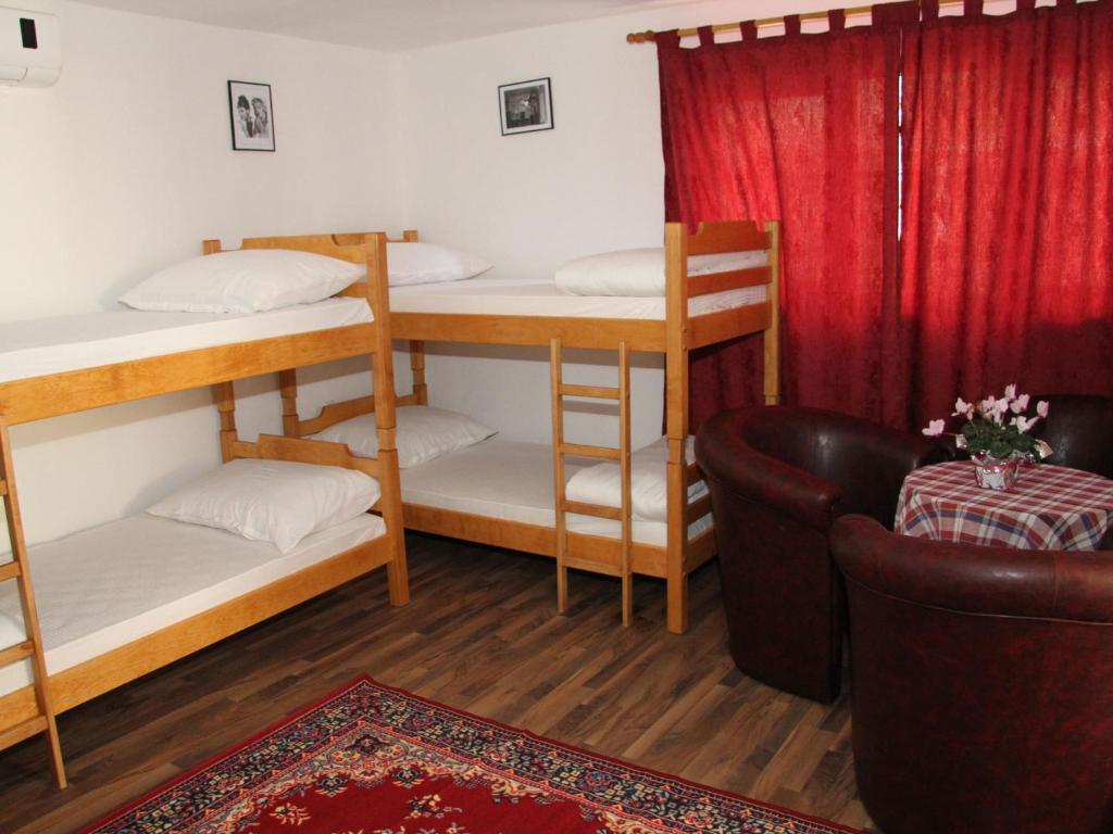 Postel nebo postele na pokoji v ubytování Hostel David