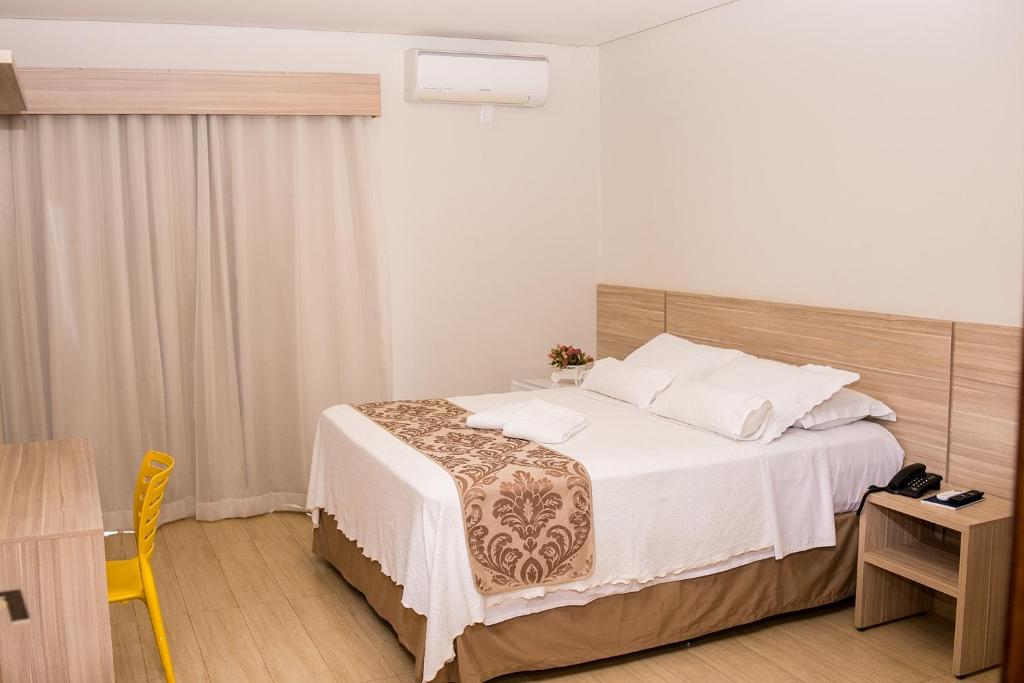 Postel nebo postele na pokoji v ubytování Le Parc Hotel